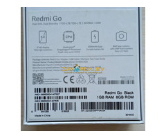 Смартфон Xiaomi Redmi Go + чехол, стекло, карта памяти