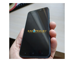 Смартфон Xiaomi Redmi Go + чехол, стекло, карта памяти